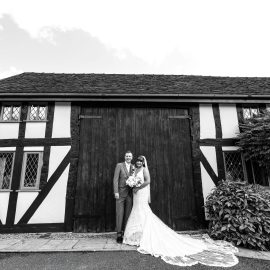 A black and white photo of a bride and groom.