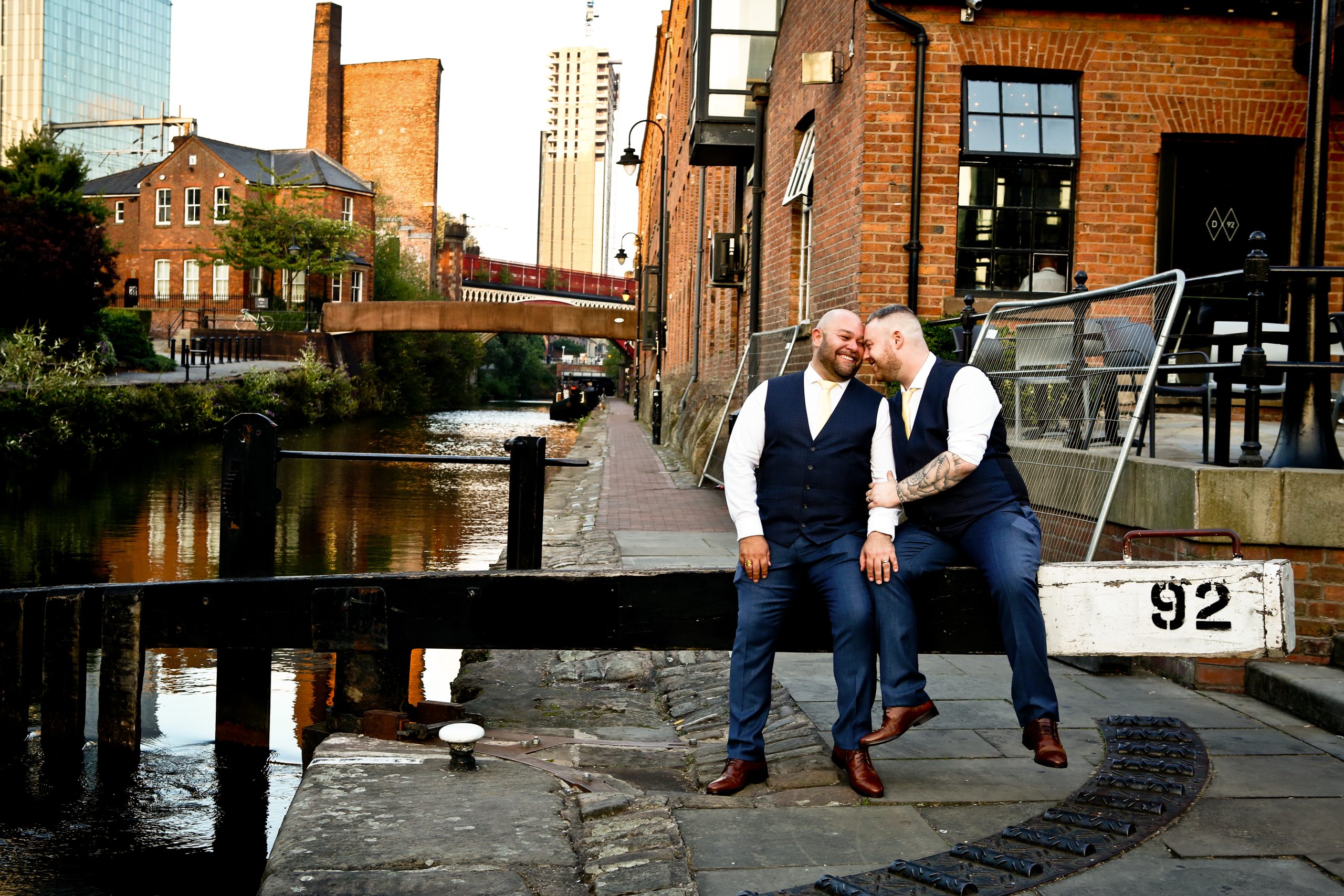 Two grooms relaxing on their wedding day at Dukes 92 in Manchester.