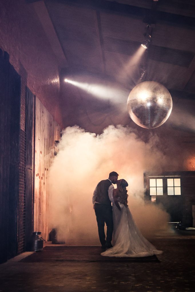 Elegant, high-contrast couple's portraits captured with studio-style precision at Owen House Wedding Barn